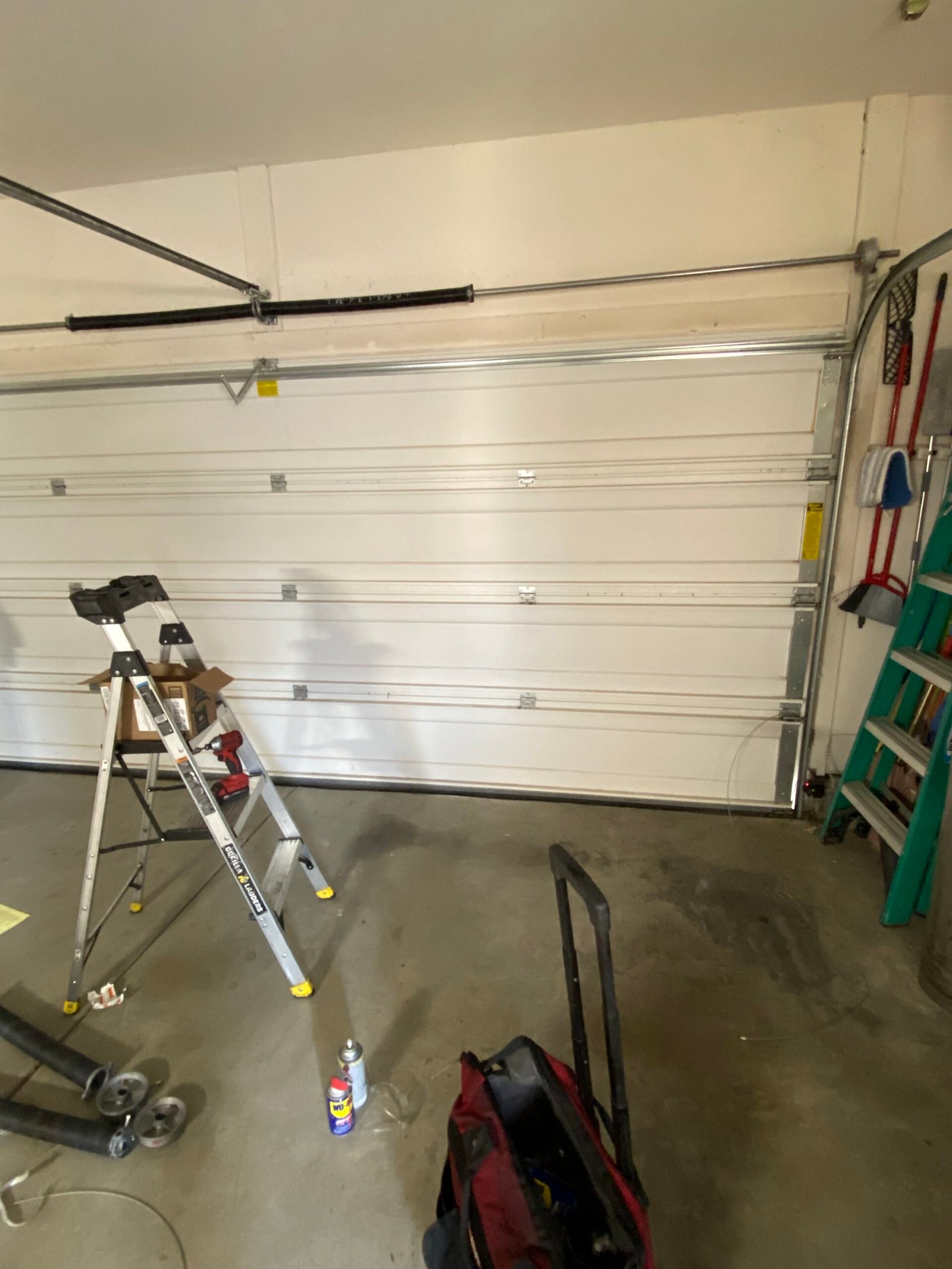 Garage door springs replacement and track inspection Santa Clarita CA